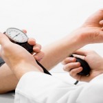 Blood pressure measuring studio shot